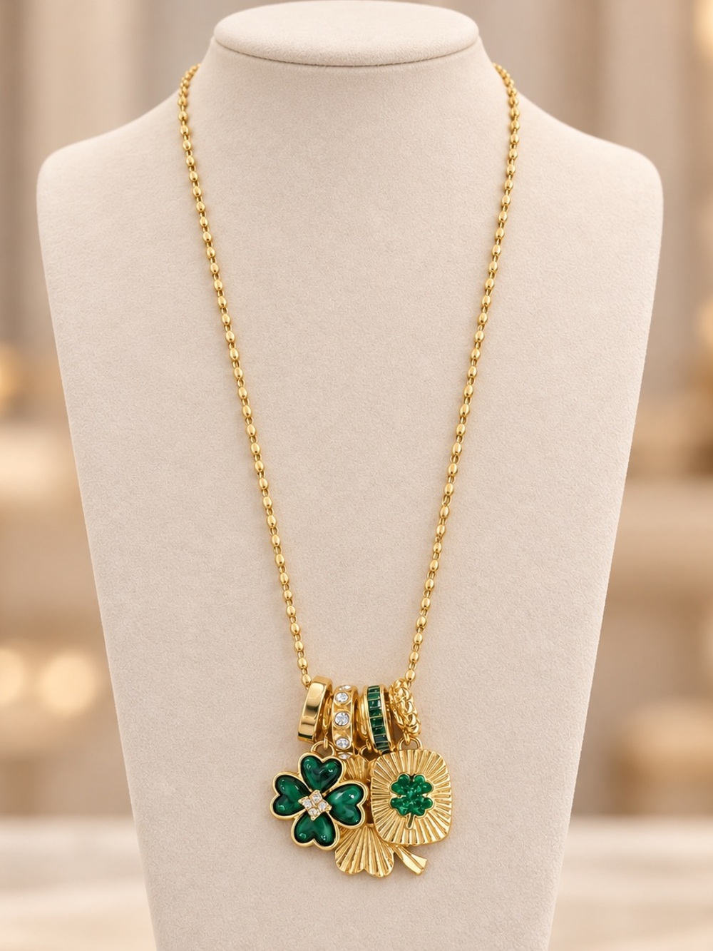 Gold Necklace with Green Clover and Charm Pendants